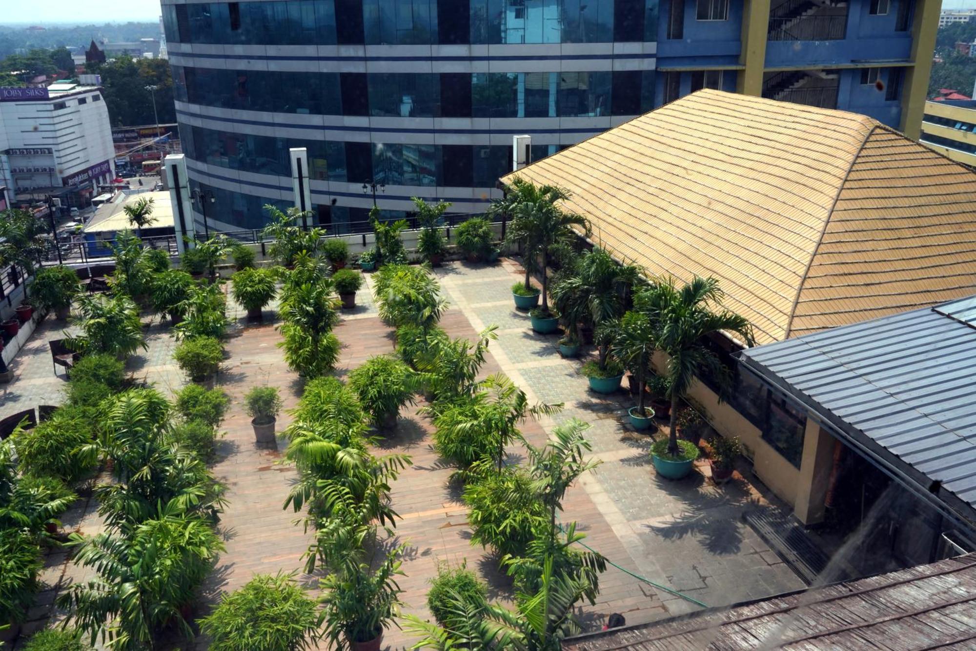 Kga Elite Continental Hotel Tiruvalla Extérieur photo