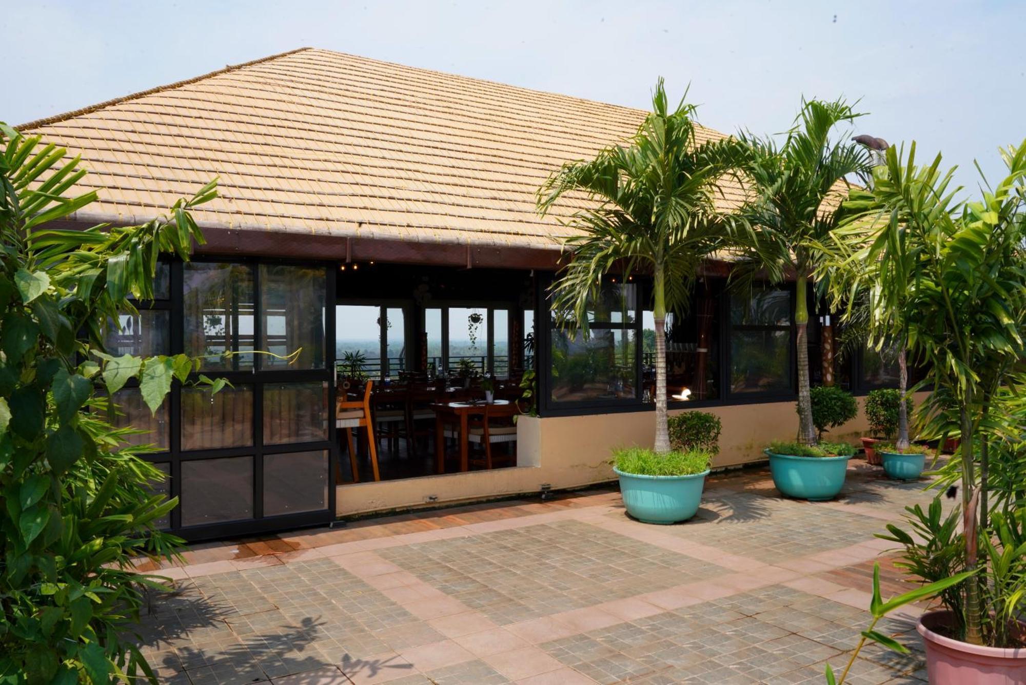 Kga Elite Continental Hotel Tiruvalla Extérieur photo