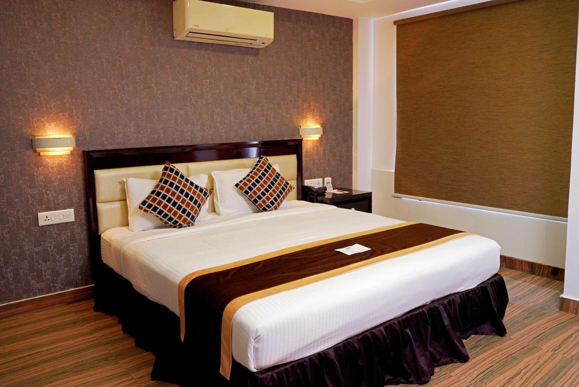 Kga Elite Continental Hotel Tiruvalla Extérieur photo