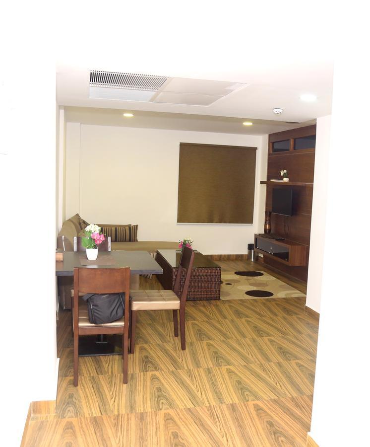 Kga Elite Continental Hotel Tiruvalla Extérieur photo