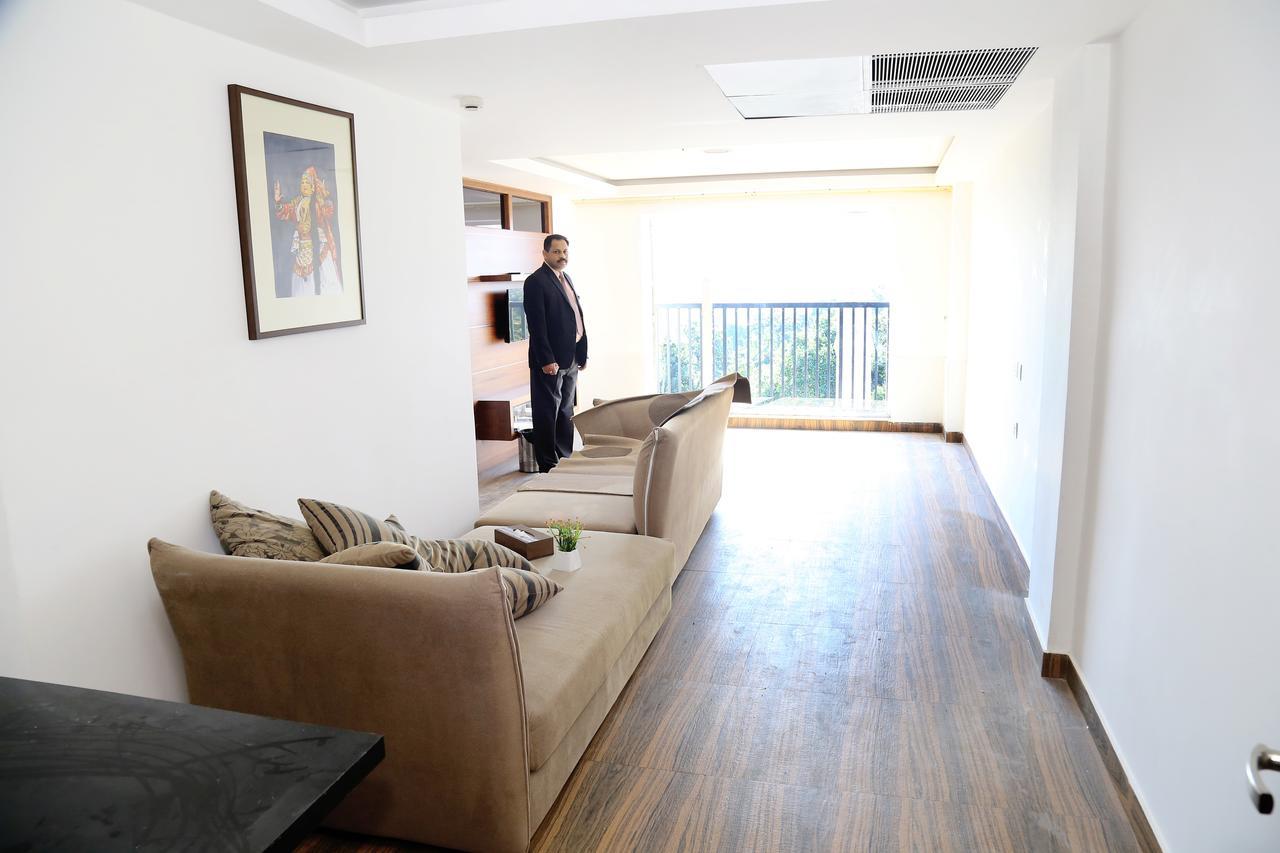 Kga Elite Continental Hotel Tiruvalla Extérieur photo