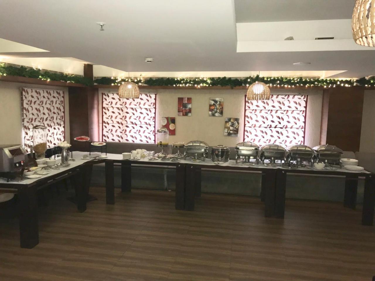 Kga Elite Continental Hotel Tiruvalla Extérieur photo
