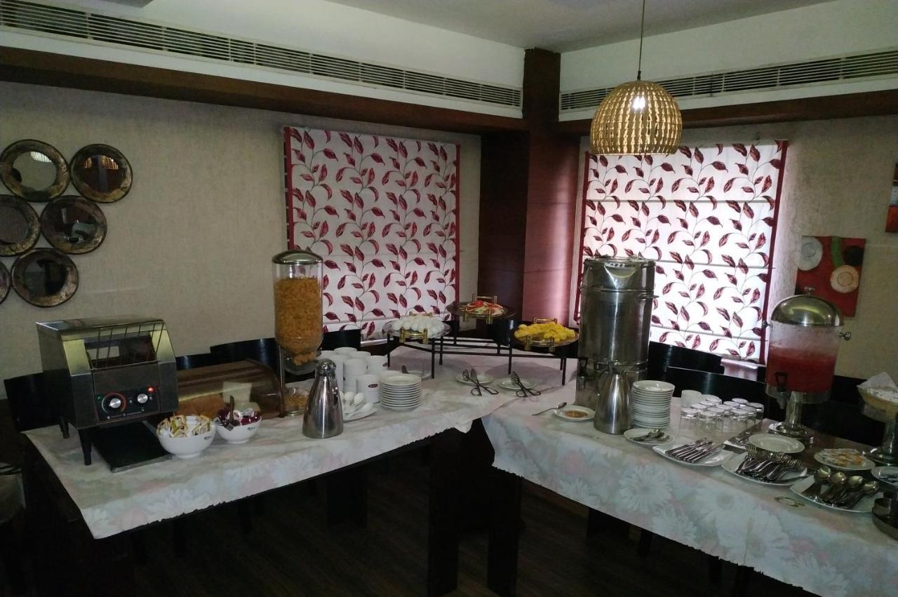 Kga Elite Continental Hotel Tiruvalla Extérieur photo