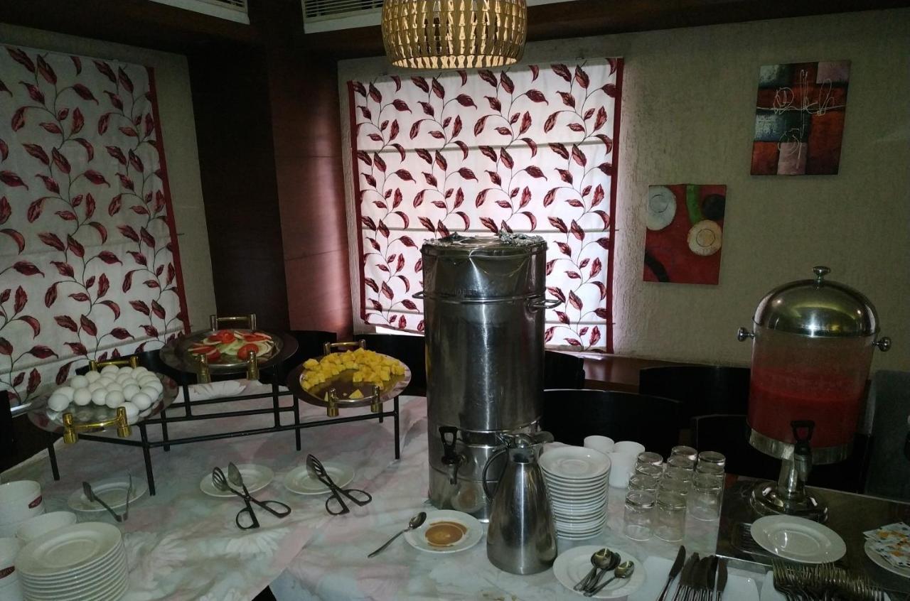 Kga Elite Continental Hotel Tiruvalla Extérieur photo