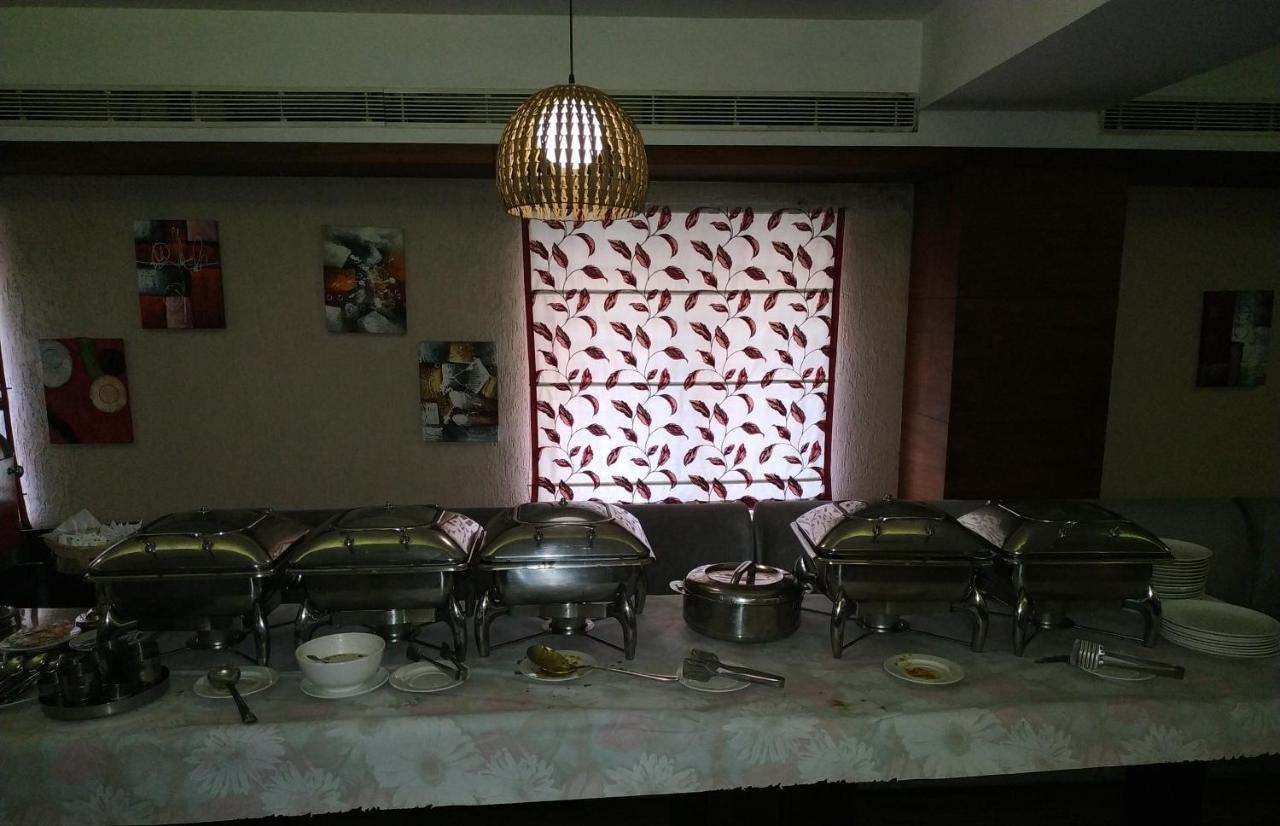 Kga Elite Continental Hotel Tiruvalla Extérieur photo