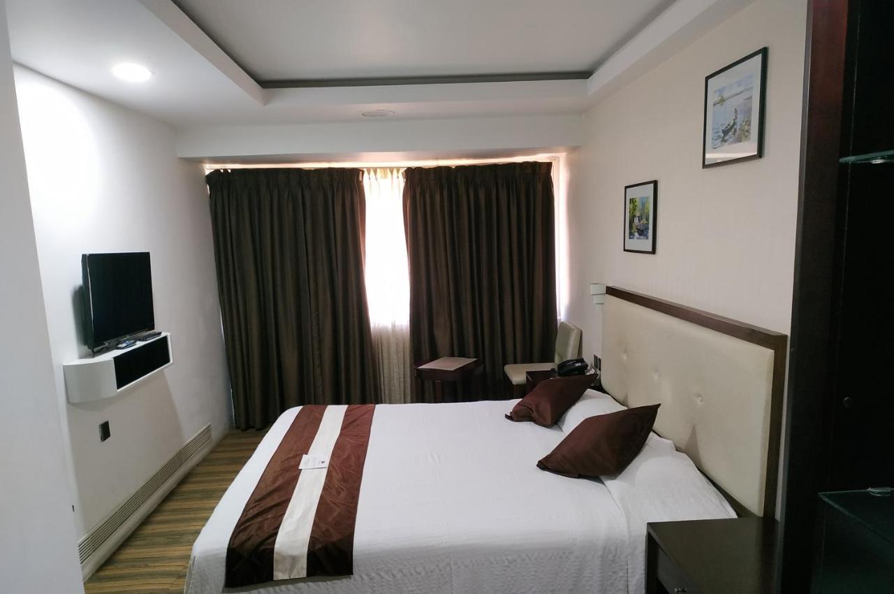 Kga Elite Continental Hotel Tiruvalla Extérieur photo