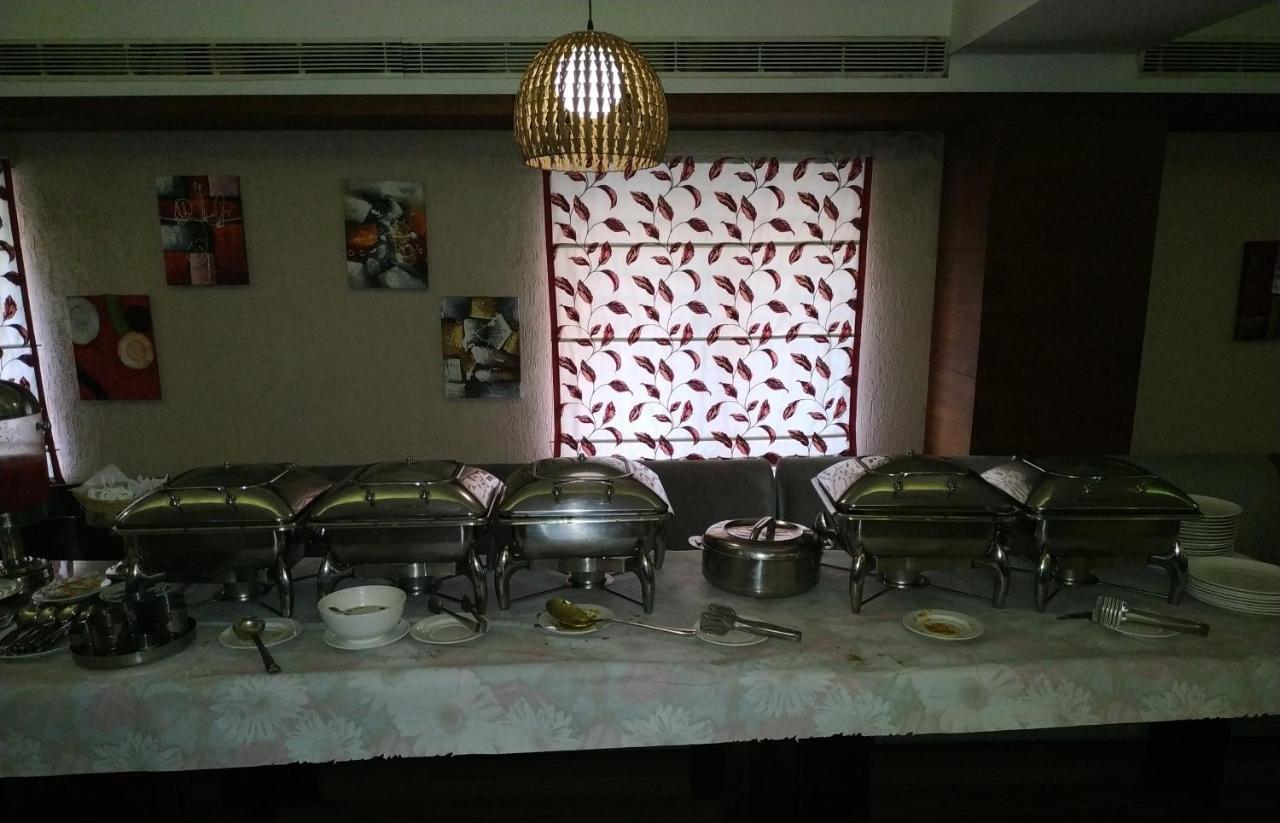 Kga Elite Continental Hotel Tiruvalla Extérieur photo